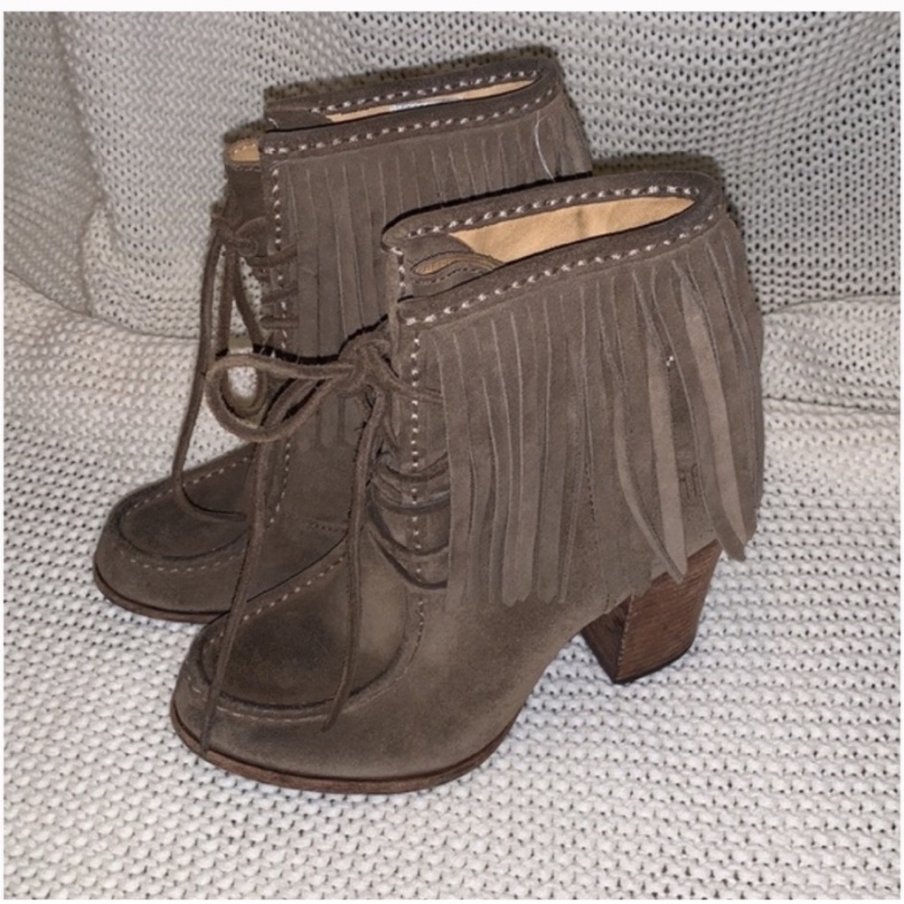 Frye boots in women’s size 7 . Fringe Ankle Boots in Brown Suede